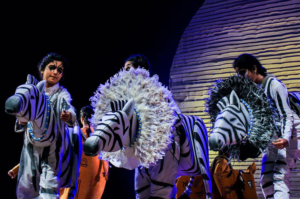 Students performing drama at school theatre — Mahadevi Birla World Academy